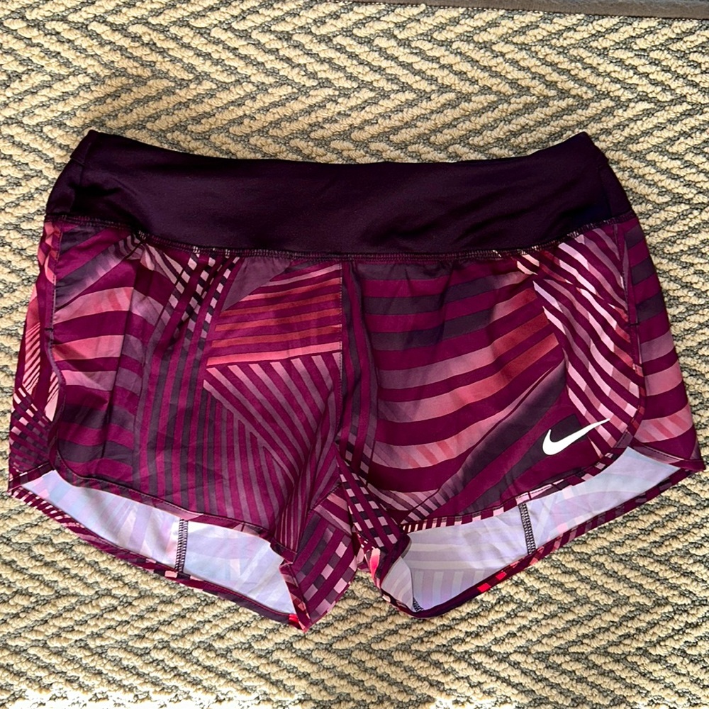 Women’s Nike athletic shorts. Back zipper pocket. Perfect condition. NWOT.
